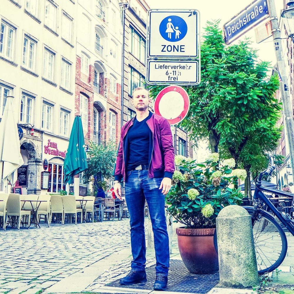 Valoramous in front of a street sign in Germany. "Rock The Dome" promo image. Courtesy of Valoramous
