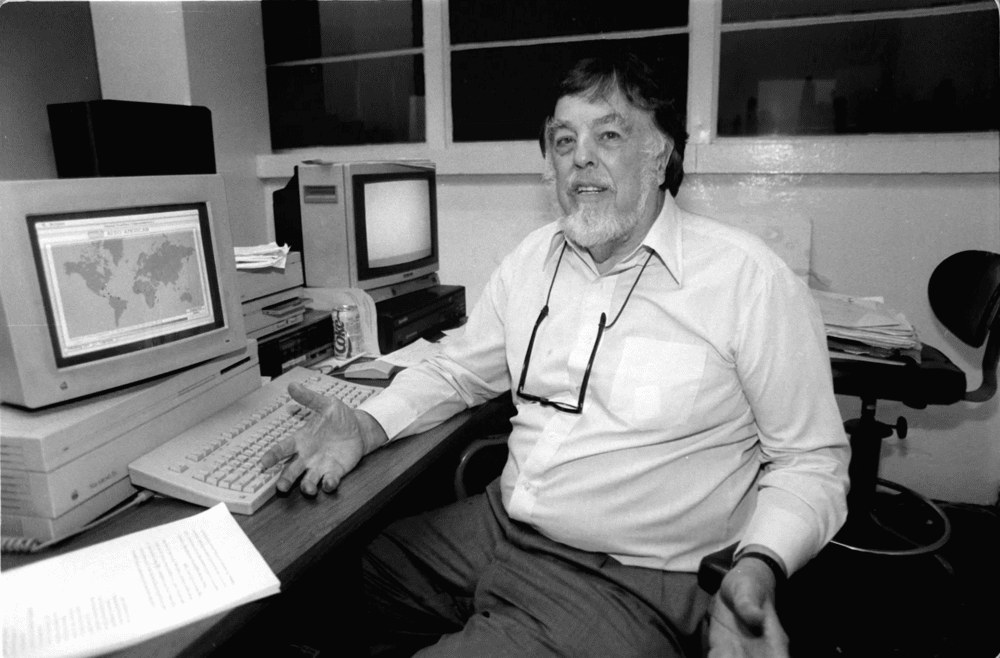 Alan Lomax working on his music database in 1992