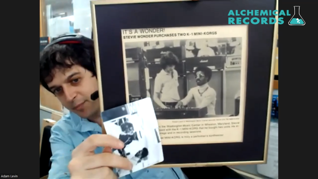 Adam Levin of Chuck Levin's Music shows pictures of Stevie Wonder visiting the historic Chuck Levin's Washington Music Center.