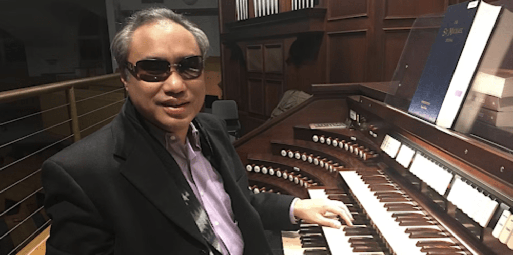 Carlos Ibay with organ