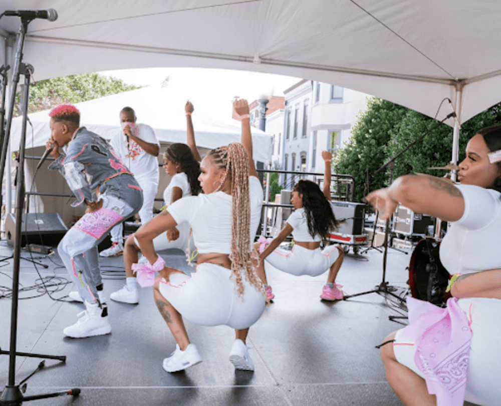 Monaé performing with dancers at the DC Funk Parade
