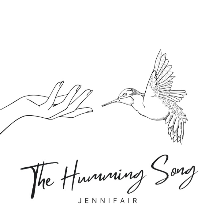Jennifair "The Humming Song" album art - an outstretched hand gently extends toward a flying hummingbird