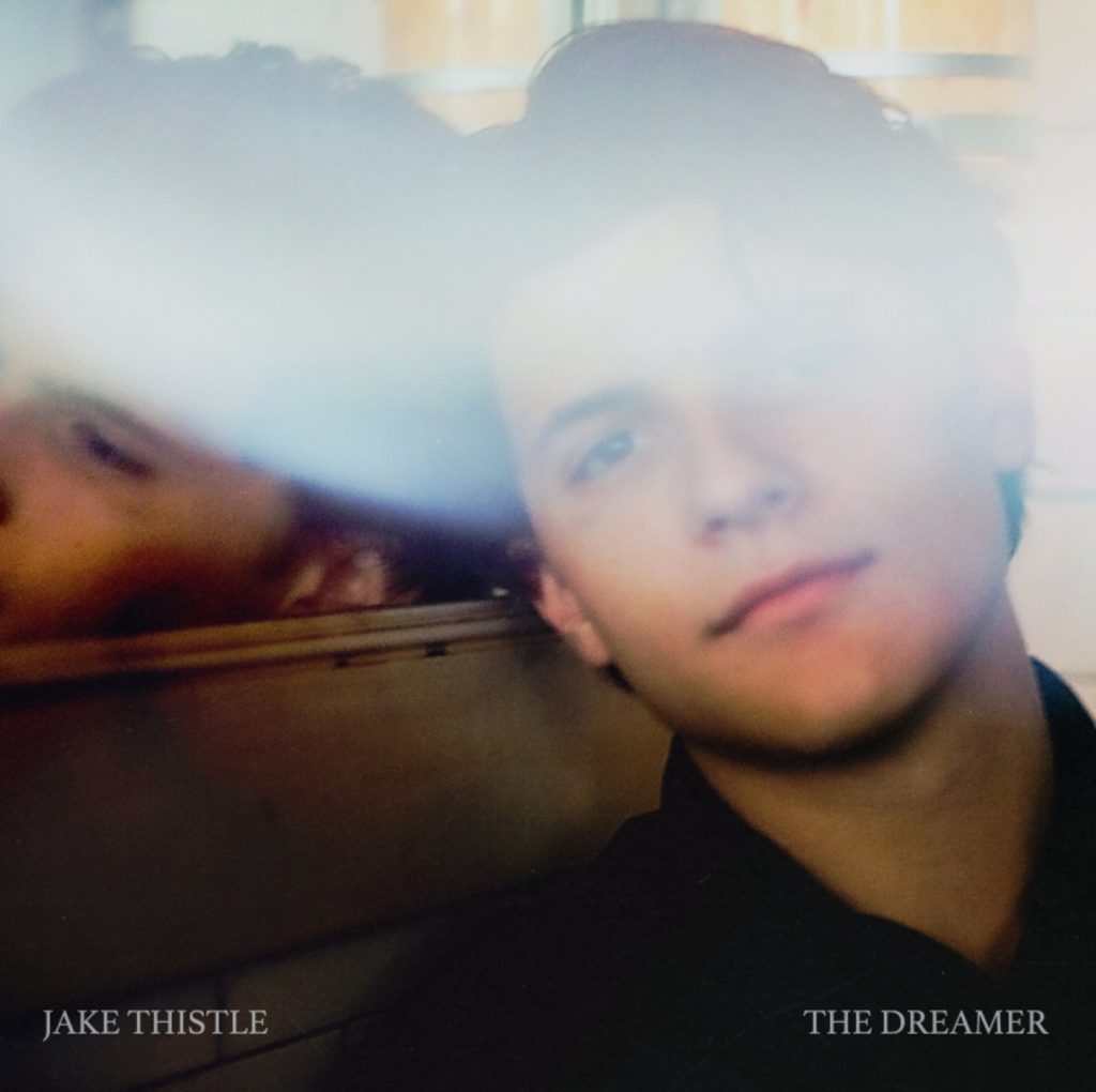 Jake Thistle - The Dreamer - album art with a photo of the artist.