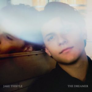 Jake Thistle - The Dreamer - album art with a photo of the artist.