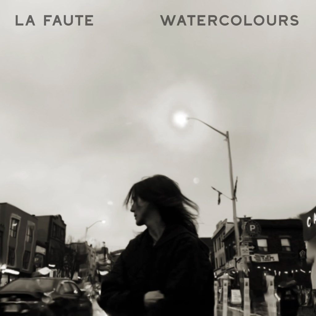La Faute - Watercolours - Album Art - Peggy Messing stands in the forefront of a city street with a grey sky lit by a lone streetlamp.