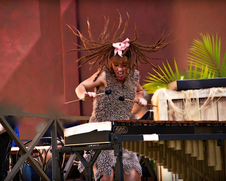 Cat Doersch performs at Bush Gardens as a cave woman - Photo courtesy of Lynn Hales