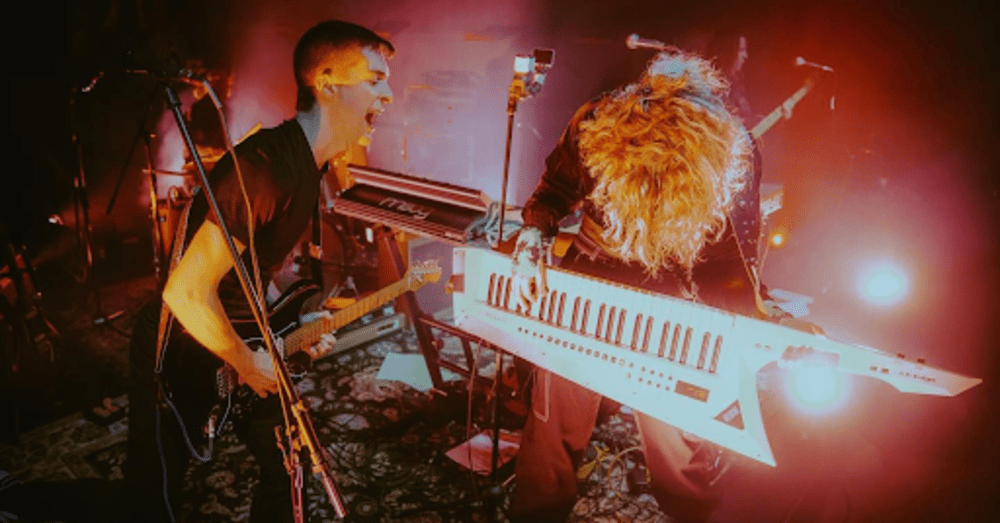 Brooke and her band playing a recent gig, Brooke playing keytar