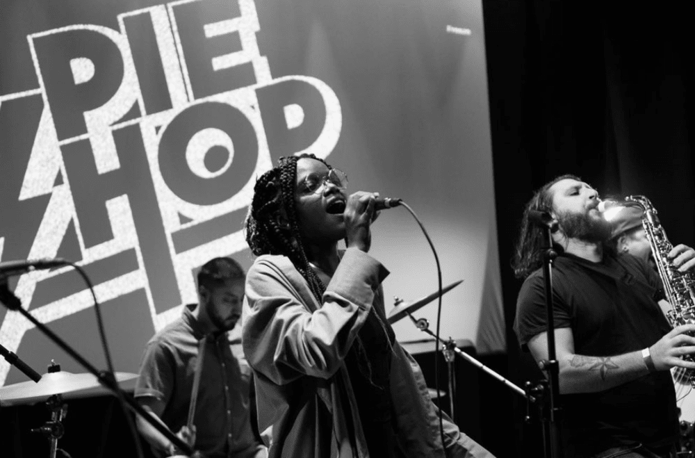 Shady Rose performing onstage with Lightmare