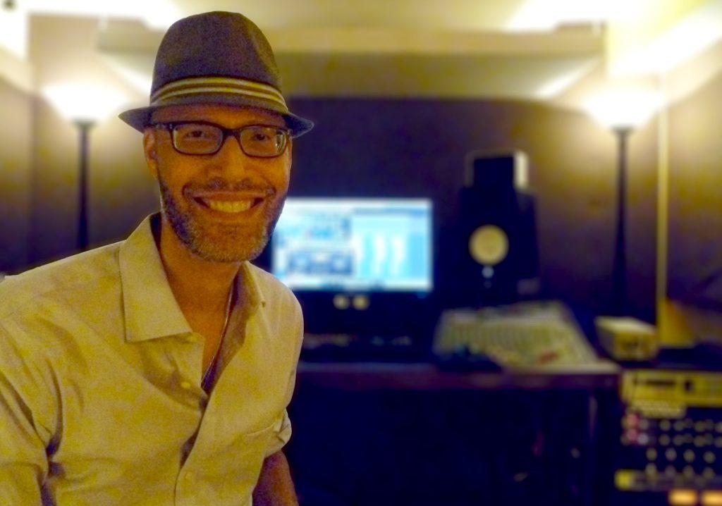 A picture of Chris Carter in his studio hat