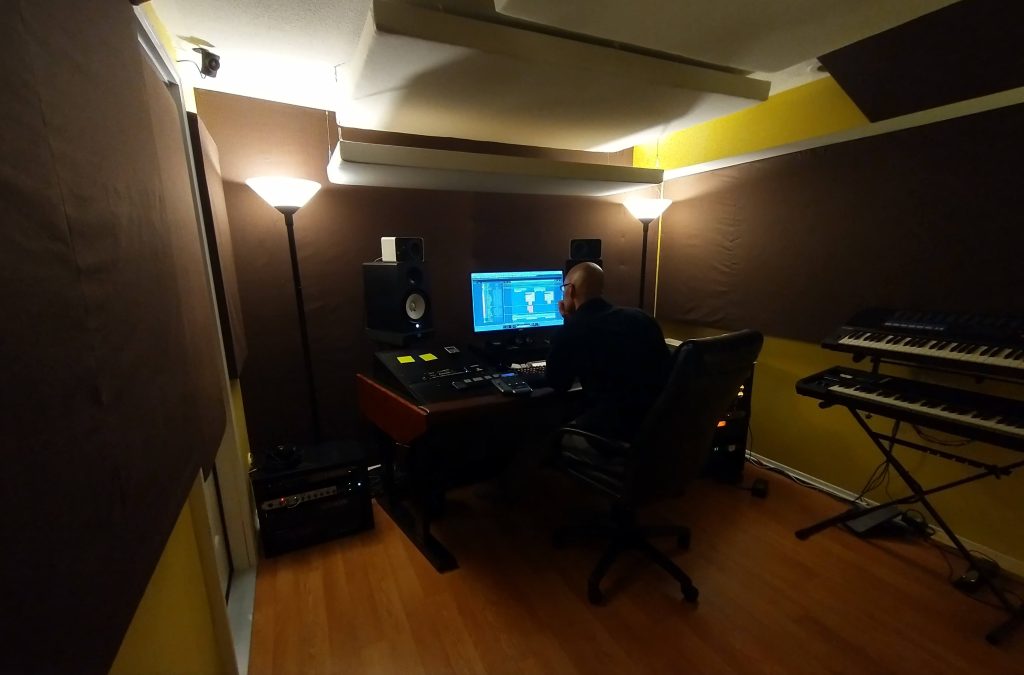 A picture of Chris Carter mixing in the studio