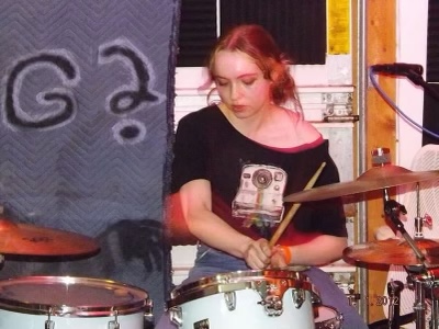 A picture of Ena Sullivan, drummer of Ski Queen