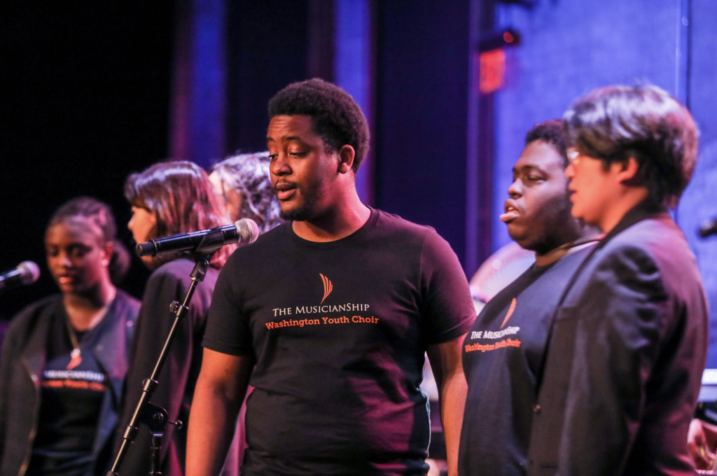 members of the Washington Youth Choir onstage at the Wammies wearing The MusicianShip shirts