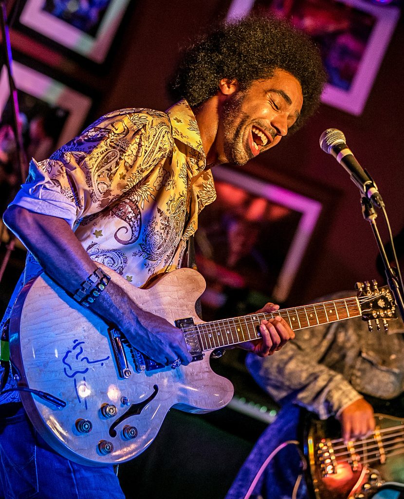 Selwyn Birchwood performs live on stage