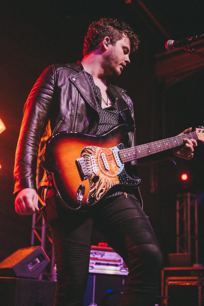 lay melton performing live on stage