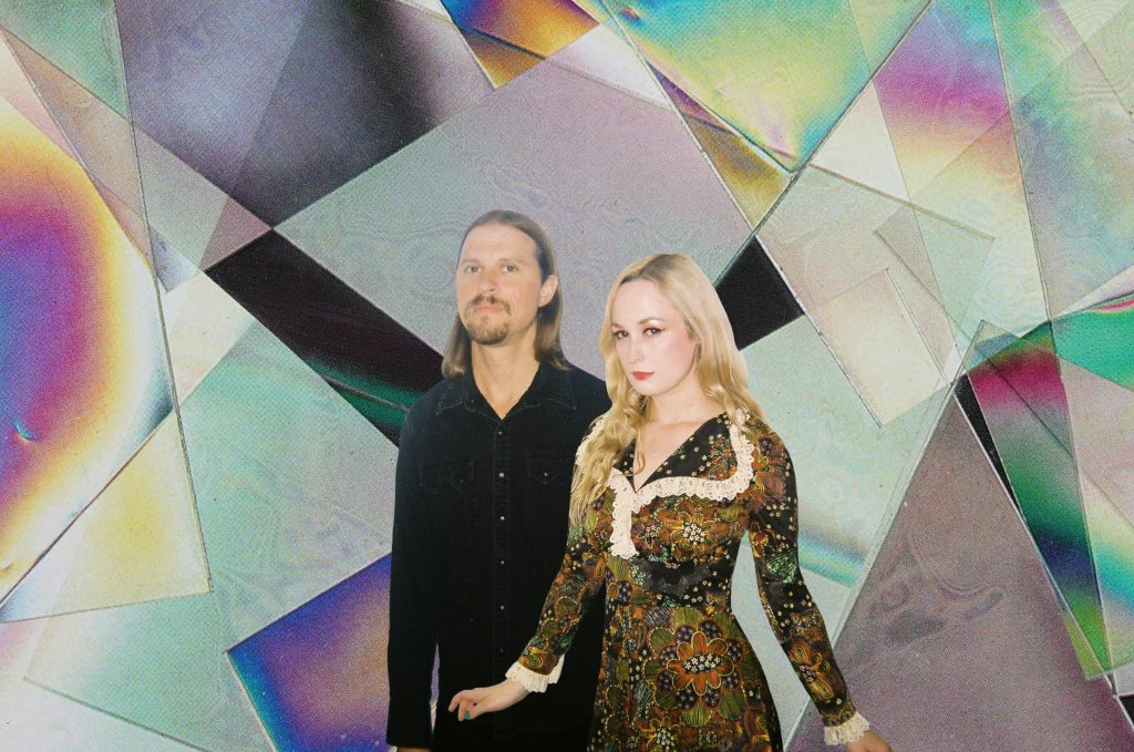 A photograph of Dora Hiller and Aric Bohn from Sneakpeek with a colorful geometric background.