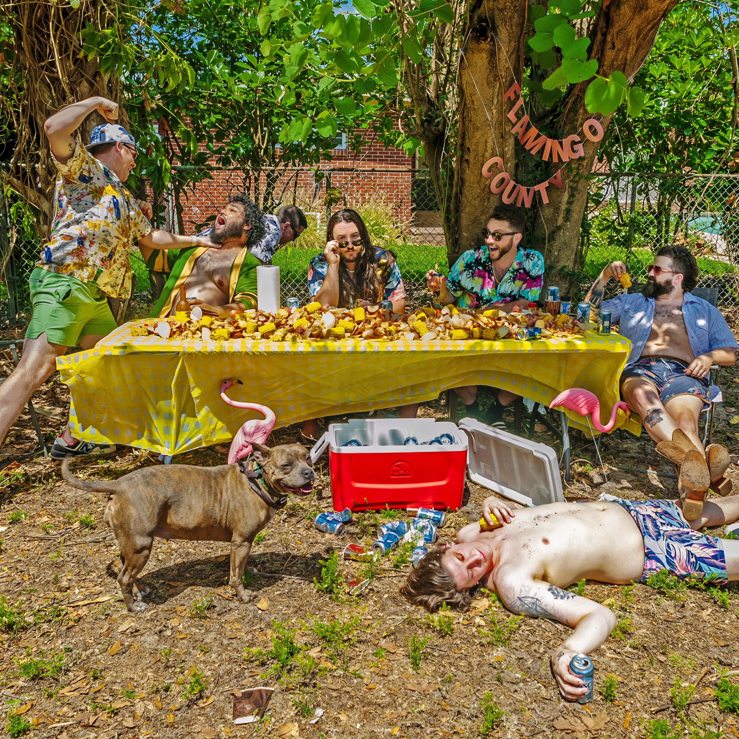 Matthew Lowry - "Flamingo County" album art depicting a "last supper scenerio" with people behind a picnic table covered in corn, an inebriated individual at their feet, and two individuals fighting on the left.