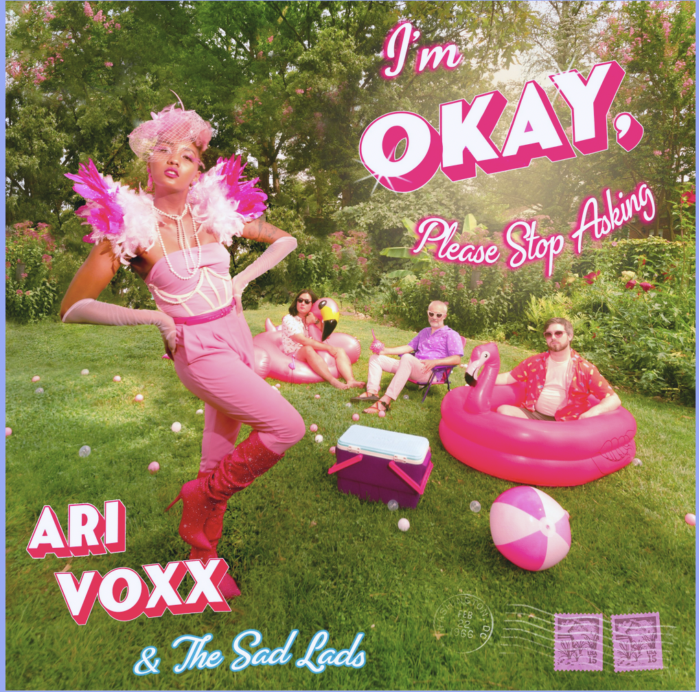 Ari Voxx - I'm Okay, Please Stop Asking - Album Art featuring the artist and her band in hot pink against a green garden landscape.