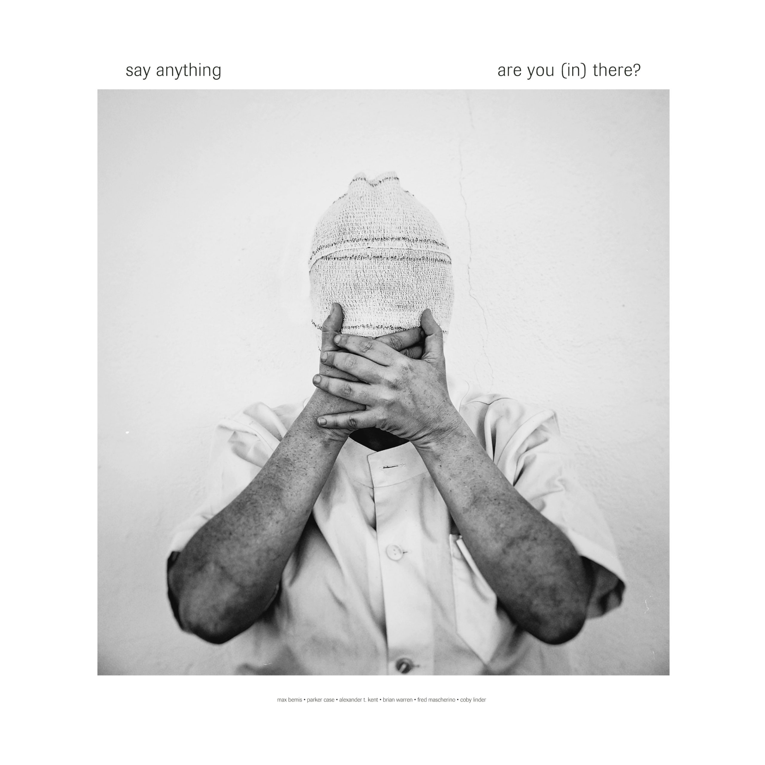 The single art for Say Anything's latest single, a man is pictured in black and white, covering his face with his hands.