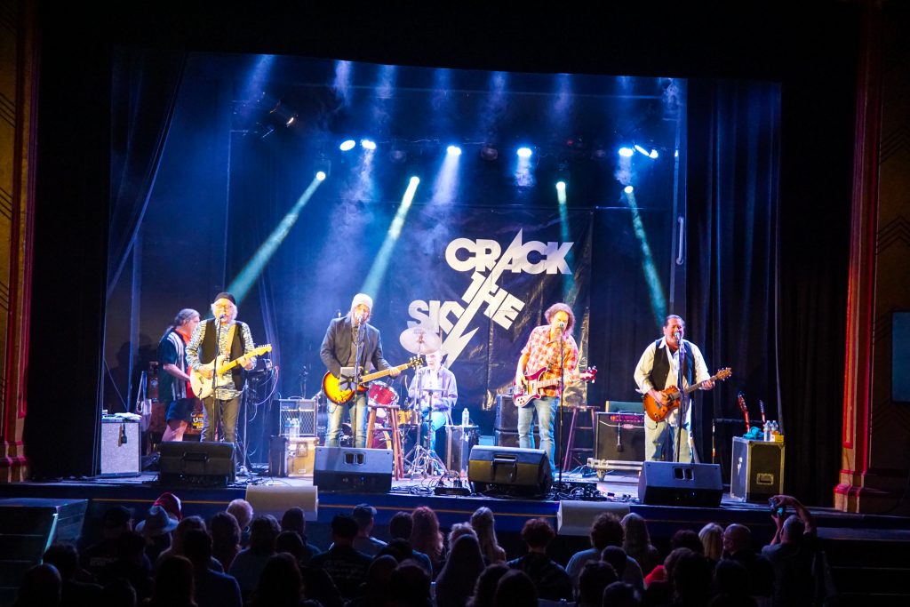 Crack The Sky performing on a stage.