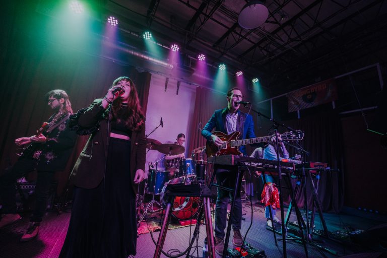 The North Country performing on stage together at Songbyrd in 2023.