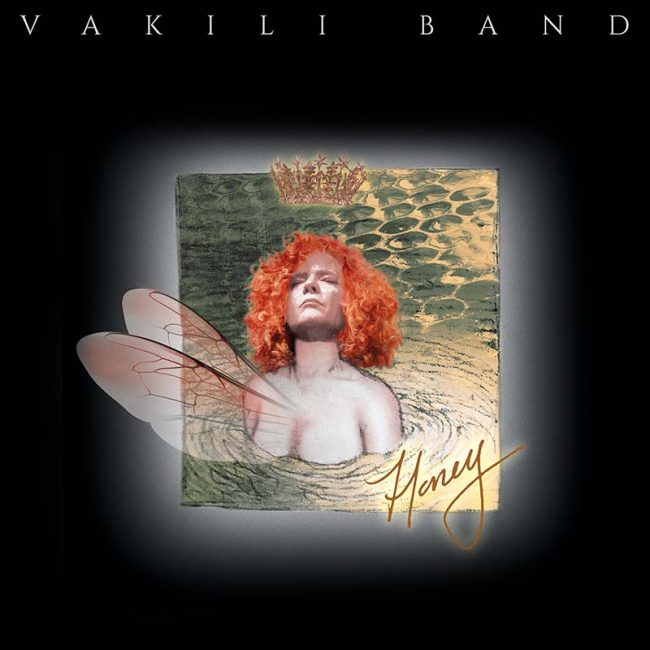 Centered in a square against a black background, Lily Vakili is sitting in a pool of honeycombed water. A crown is floating above her headm and she is looking up at it with closed eyes.