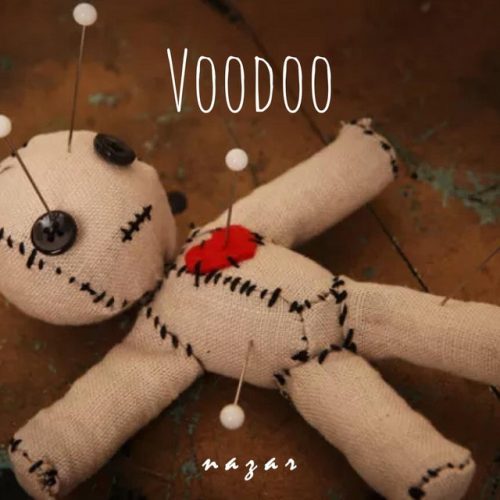 Nazar "Voodoo" album art - a voodoo doll with pins stuck on it lies on a wooden table